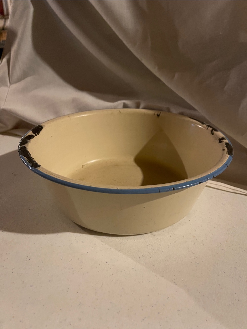 Antique Cream Enamel Bowl with Blue Rim m